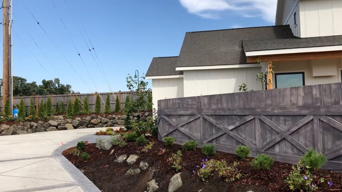 Hatfield driveway and fence 2. John takes us on a walkthrough of the Hatfield project, starting with new home exterior design standards. For this new home build John tied interior and exterior accents together in charming ways.